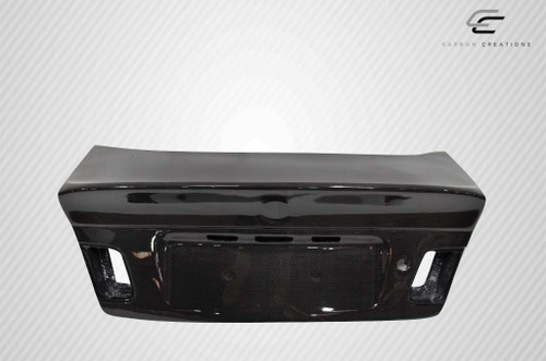 1999-2005 BMW 3 Series E46 4DR Carbon Creations DriTech CSL Look Trunk- 1 Piece / Vehicle Year Make Model Trim - 1999-2005-BMW 3 Series 4DR / Product Type - Trunk/Hatch / Style Name -CSL Look / Kit Material - Carbon Fiber / Notes -