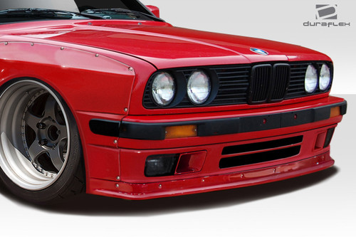 1984-1991 BMW 3 Series E30 Duraflex TKO Front Lip - 1 Piece / Vehicle Year Make Model Trim - 1984-1991-BMW 3 Series ALL / Product Type - Front Lip/Add On / Style Name -TKO / Kit Material - FRP (Fiberglass Reinforced Plastics) / Notes - Note: Front lip is designed to be used with M-Tech front bumper, all other models will require modification
