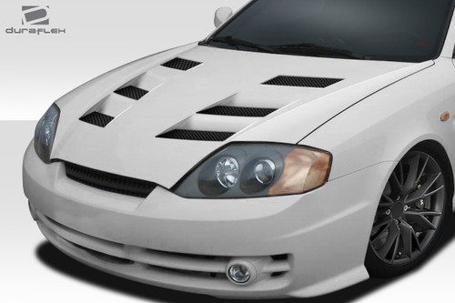 2003-2006 Hyundai Tiburon Duraflex AM-S Hood - 1 Piece / Vehicle Year Make Model Trim - 2003-2006-Hyundai Tiburon ALL / Product Type - Hood / Style Name -AM-S / Kit Material - FRP (Fiberglass Reinforced Plastics) / Notes - Note: Hood pins are required.