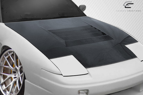 1989-1994 Nissan 240SX S13 Carbon Creations D-1 Hood - 1 Piece / Vehicle Year Make Model Trim - 1989-1994-Nissan 240SX ALL / Product Type - Hood / Style Name -D-1 / Kit Material - Carbon Fiber / Notes - Note: Hood pins are required.