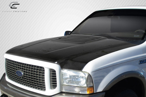 1999-2007 Ford Super Duty / 2000-2005 Ford Excursion Carbon Creations Raptor Look Hood - 1 Piece / Vehicle Year Make Model Trim - 1999-2007-Ford Super Duty ALL / Product Type - Hood / Style Name -Raptor Look / Kit Material - Carbon Fiber / Notes - Hood pins are required.