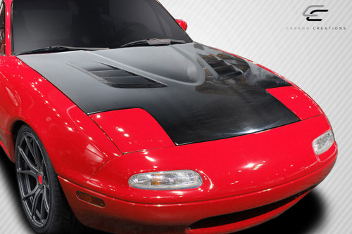 1990-1997 Mazda Miata Carbon Creations DriTech Venom Hood - 1 Piece / Vehicle Year Make Model Trim - 1990-1997-Mazda Miata ALL / Product Type - Hood / Style Name -Venom / Kit Material - Carbon Fiber / Notes - Hood pins are required.