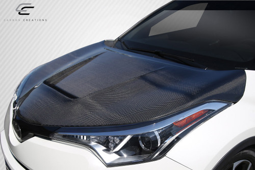 2018-2022 Toyota C-HR Carbon Creations Circuit Hood - 1 Piece / Vehicle Year Make Model Trim - 2018-2022-Toyota C-HR ALL / Product Type - Hood / Style Name -Circuit / Kit Material - Carbon Fiber / Notes - Note Hood pins are required.