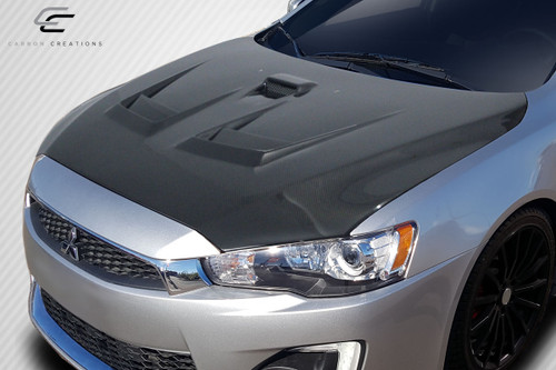 2008-2017 Mitsubishi Lancer / Lancer Evolution 10 Carbon Creations D Spec Hood - 1 Piece / Vehicle Year Make Model Trim - 2008-2017-Mitsubishi Lancer ALL / Product Type - Hood / Style Name -D Spec / Kit Material - Carbon Fiber / Notes - Note: Hood pins are required.