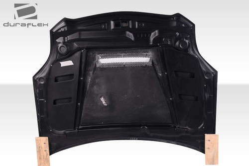 2006-2012 Mitsubishi Eclipse Duraflex Magneto Hood - 1 Piece / Vehicle Year Make Model Trim - 2006-2012-Mitsubishi Eclipse ALL / Product Type - Hood / Style Name -Magneto / Kit Material - FRP (Fiberglass Reinforced Plastics) / Notes - Note: Hood pins are required.