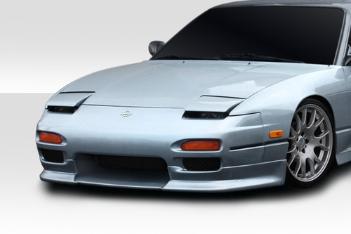 1991-1994 Nissan 240sx S13 Duraflex Estra Front Lip - 1 Piece / Vehicle Year Make Model Trim - 1991-1994-Nissan 240SX ALL / Product Type - Front Lip/Add On / Style Name -Estra / Kit Material - FRP (Fiberglass Reinforced Plastics) / Notes -