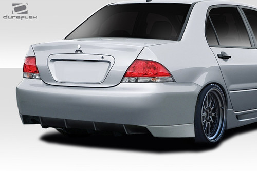 2004-2007 Mitsubishi Lancer Duraflex Trackstar Rear Bumper - 1 Piece / Vehicle Year Make Model Trim - 2004-2007-Mitsubishi Lancer ALL / Product Type - Rear Bumper / Style Name -Trackstar / Kit Material - FRP (Fiberglass Reinforced Plastics) / Notes -