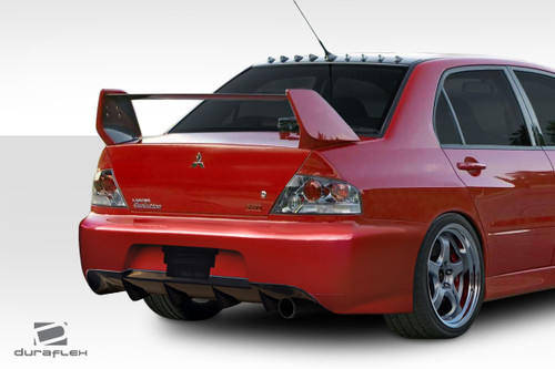 2003-2006 Mitsubishi Lancer Evolution 8 9 Duraflex VTX Rear Bumper Cover - 1 Piece / Vehicle Year Make Model Trim - 2003-2006-Mitsubishi Lancer ALL / Product Type - Rear Bumper / Style Name -VTX / Kit Material - FRP (Fiberglass Reinforced Plastics) / Notes -