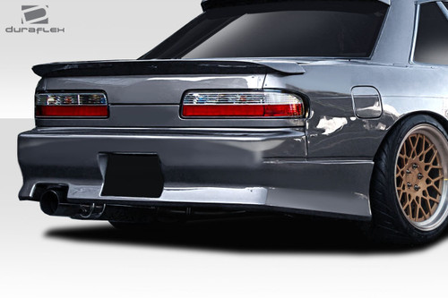 1989-1994 Nissan 240SX S13 2DR Convertible Duraflex WX-9 Rear Bumper Cover - 1 Piece / Vehicle Year Make Model Trim - 1989-1994-Nissan 240SX 2DR / Product Type - Rear Bumper / Style Name -WX-9 / Kit Material - FRP (Fiberglass Reinforced Plastics) / Notes -