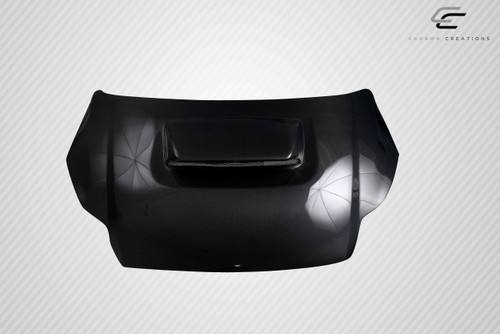 2012-2014 Ford Focus Carbon Creations Ram Air Hood - 1 Piece / Vehicle Year Make Model Trim - 2012-2014-Ford Focus ALL / Product Type - Hood / Style Name -Ram Air / Kit Material - Carbon Fiber / Notes - Note: Hood pins are required.