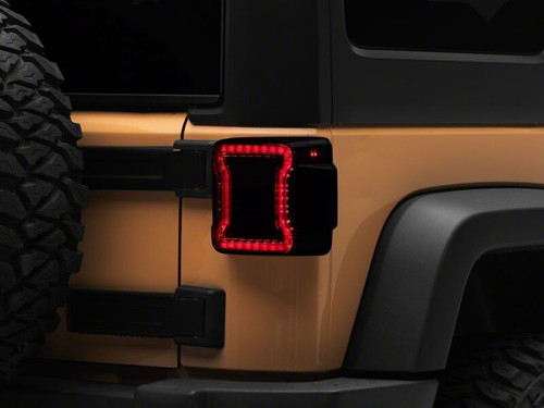 Raxiom 07-18 Jeep Wrangler JK Axial Series JL Style LED Tail Lights- Black Housing- Smoked Lens - J183257 Photo - Primary