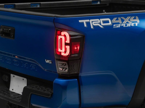 Raxiom 16-23 Toyota Tacoma XW Series Sequential LED Tail Lights- Black Housing- Clear Lens - TT30331 Photo - Primary
