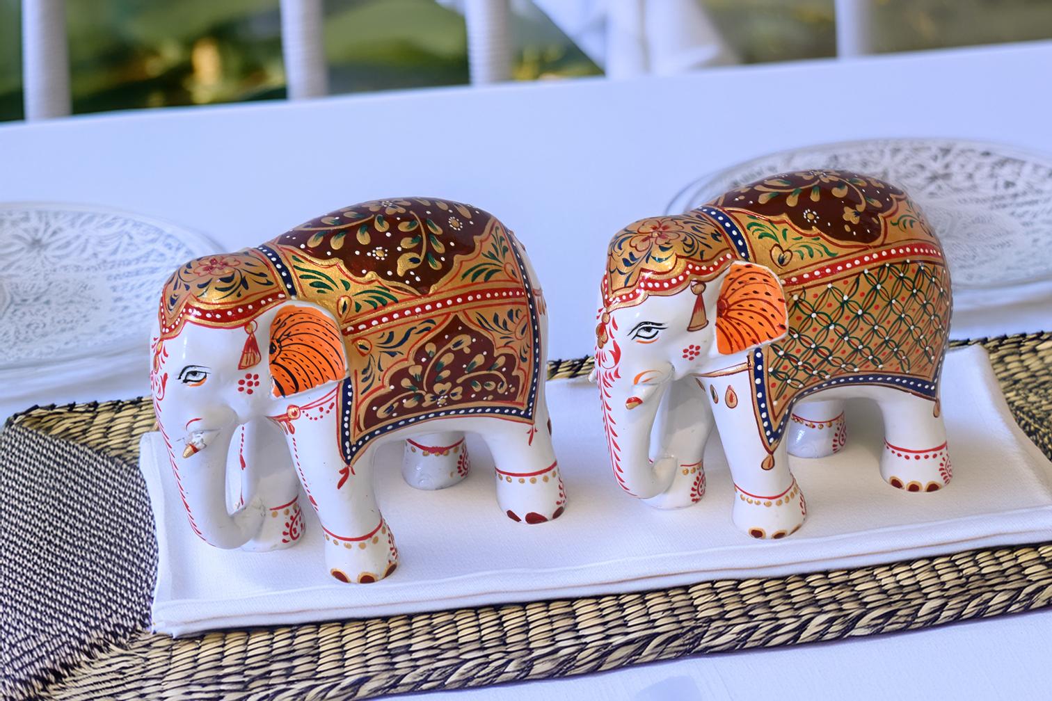 Hand-painted white Mughal elephant set of 2 with embossed artwork and decorative gift box by Kaushalam artisans.