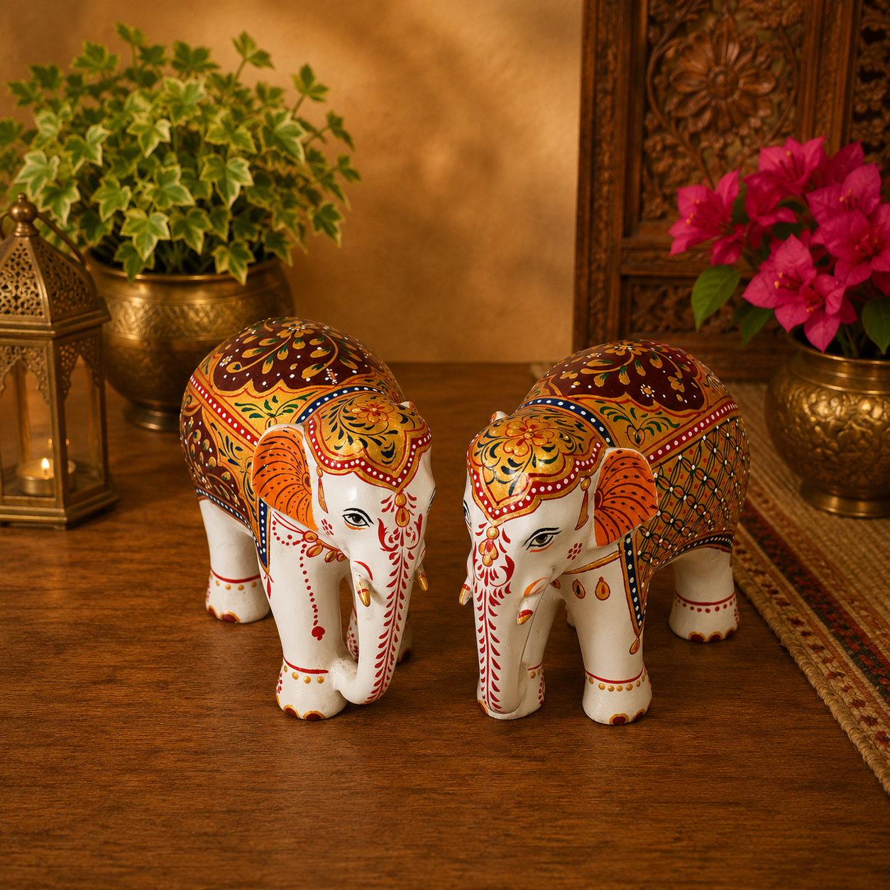 Hand-painted white Mughal elephant set of 2 with embossed artwork and decorative gift box by Kaushalam artisans.