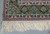 The border shot shows the beautiful finish and of this hand made Iranian rug on a silk foundation