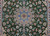Close up showing the stunning rare colour pallet of this rug with soft blue, beige and different shades of green. The traditional central medallion is surrounded by stunning floral designs to create a beautiful design