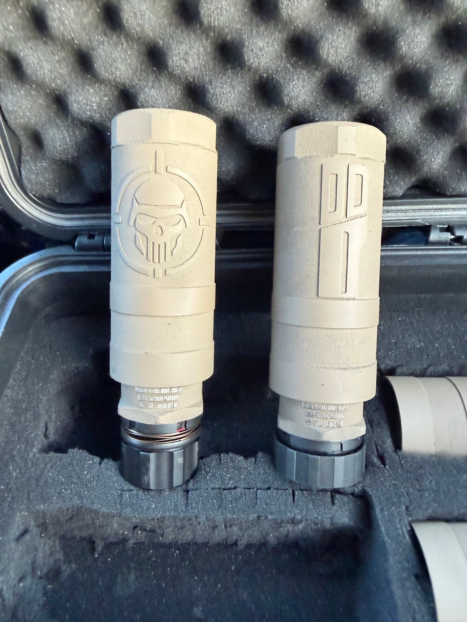 Two suppressors vertical