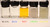 IFPAP inks under normal illumination.  Black and blue are completely clear, red is tinted orange, and green/yellow are opaque (and require shaking to mix before use).