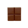 Unwrapped Milkless Minis chocolate piece featuring a smooth, segmented rectangular shape.