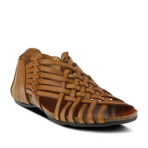 Camel hand woven sandal with natural cork wedge outsole. Camel hand woven sandal with natural cork wedge outsole.