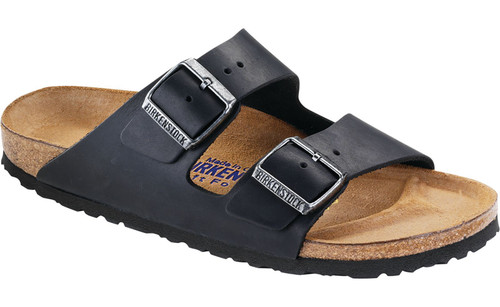 Black oiled leather with soft foodbed over cork footbed by Birkenstock.