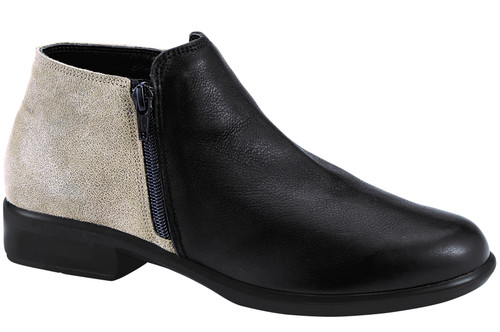 Soft black and beige speckled side zip half boot. Soft black and beige speckled side zip half boot.