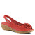 Red perf leather peep toe wedge with tonal leather flower .