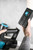 Aspiradora sin cable de 130 W · con soporte de pared y accesorios