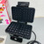Gofrera Tristar WF-1165 abierta con placas antiadherentes