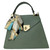Bolso de mano trapecio de piel con pañuelo en color menta