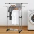 Perchero de ropa con ruedas y doble barra regulable · 25 kg
