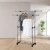 Perchero de ropa con ruedas y doble barra regulable · 25 kg