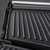 Placa superior estriada gris muy oscuro del grill de contacto Adler, con brazo negro brillante y asa de barra plateada