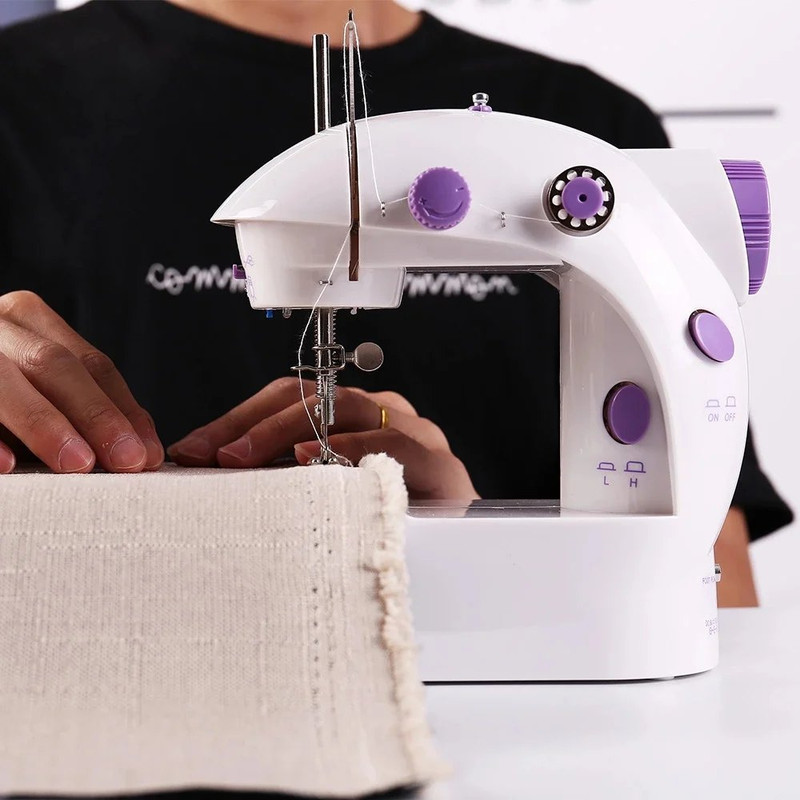 Máquina de coser eléctrica portátil · con pedal y luz