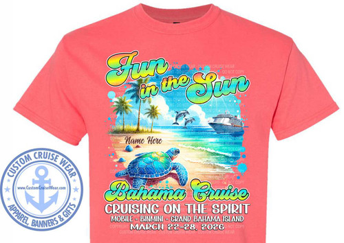 The image displays a coral-colored t-shirt with a vibrant graphic design on the front. The design features a beach scene with the words "Fun in the Sun" in large, colorful, and stylized lettering, with the word "Fun" rendered in a rainbow gradient effect. Below this, the words "Bahama Cruise" are written in a similar style. The design also includes visual elements such as palm trees, dolphins jumping out of the water, a cruise ship, and a sea turtle on a sandy beach. A space for a name is present. Additional text specifies "Cruising on the Spirit," "Mobile - Binmini - Grand Bahama Island," and the date "March 22-28, 2026." The graphic is surrounded by stylized splashes of blue and green, enhancing the tropical theme.
