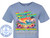 The image displays a light blue t-shirt with a vibrant graphic design printed on the front. The design features a tropical beach scene with a large cruise ship in the background.

The top of the design is dominated by colorful, playful text. The words "Good Times" are written in a bright, gradient font that shifts from yellow to pink to purple, outlined in black. Below this, "Great Friends" is written in a similar style, with colors transitioning from green to blue to yellow, also with a black outline.

The beach scene itself is detailed. There are palm trees with green fronds and brown trunks on either side, silhouetted against a sunset sky that transitions from orange at the horizon to pink and then a lighter blue at the top. A large, white cruise ship with multiple decks and windows is prominently featured sailing on calm blue water.

In the foreground, there is a sandy beach with scattered seashells. Colorful tropical flowers, including bright pink and red hibiscus, as well as smaller blue and white flowers, are arranged along the edge of the sand. A section of the beach shows the names "Phil & Brenda" written in a light brown, slightly distressed font.

Below the beach scene, the text "Amazing Memories" is written in large, bubbly letters with a gradient of yellow, green, and blue, outlined in black. Beneath this, the text "CRUISING ON THE CELEBRATION" is in all caps, a lighter gray color with a black outline.

The cruise itinerary is listed below that: "MIAMI - COZUMEL - ROATAN - GRAND BAHAMA". The dates "JULY 12-19, 2026" are also in a similar font and color.

On the lower left of the t-shirt, there is a circular logo for "CUSTOM CRUISE WEAR". The logo is blue and white, featuring an anchor in the center and text around the perimeter. The website "www.CustomCruiseWear.com" is visible within the anchor.

Throughout the design, there are numerous subtle, semi-transparent watermark-like text overlays that read "COPYRIGHT - DO NOT COPY - CUSTOM CRUISE WEAR", indicating that this is a design for custom apparel. The overall composition is well-balanced, with the graphic occupying the central portion of the t-shirt. The colors are bright and evoke a feeling of vacation and celebration.