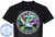 The image displays a black t-shirt with a circular graphic design printed on the front. The graphic is centered and takes up a significant portion of the shirt's chest area. The t-shirt itself is a plain black short-sleeved crew neck.

The main circular graphic features a detailed scene. At the center of the circle is a large, modern cruise ship, depicted from its port side, sailing on calm water. Above the ship, a vibrant aurora borealis or Northern Lights display paints the sky with swirling bands of bright green, purple, and pink. Silhouetted mountains can be seen in the background behind the aurora.

Text is integrated into the circular design. The outermost ring of the circle contains text that reads, "MAKING MEMORIES CRUISING ALASKA" in white capital letters. Below this, separated by dots, are port names and dates: "ANCHORAGE - ICY STRAIT POINT - JUNEAU - SKAGWAY - KETCHIKAN - VANCOUVER, BC" followed by "SEPTEMBER 14-21, 2026". These are also in white capital letters, with the date range being slightly larger.

Inside the main circle, overlaying the aurora and the ship, is the word "JADE" in large, bold, white capital letters. The word "ON THE" is smaller and positioned above "JADE".

In the bottom left quadrant of the t-shirt, separate from the main circular graphic, is another circular logo. This logo is primarily blue and white. It has text around its perimeter that reads "CUSTOM CRUISE WEAR" and "APPAREL, BANNERS & GIFTS". At the very center of this logo is a stylized blue anchor with a rope wrapped around it. The website "www.CustomCruiseWear.com" is printed on a banner-like element within this logo.

The background of the t-shirt graphic itself, behind the main circular design, is filled with a faded, repeating pattern of the words "CUSTOM CRUISE WEAR" and "COPYRIGHT - DO NOT COPY" in a light gray color. This creates a subtle texture and branding element.

The overall color palette is dominated by black from the t-shirt, white for the text and logos, and the vivid, multi-colored aurora in the central graphic. The cruise ship is depicted with white and blue hull details and orange lifeboats. The anchor logo uses shades of blue and white. The composition is balanced, with the main graphic drawing the eye to the center, and the smaller logo providing additional branding on the side. The design is clearly for a cruise-themed event or souvenir.
