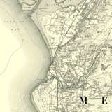 Close up of authentic reproduction of Ordnance Survey map of Harlech 1896-1904 with a yellow tint background
