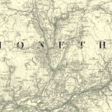 Close up of authentic reproduction of Ordnance Survey map of Harlech 1896-1904 with a yellow tint background
