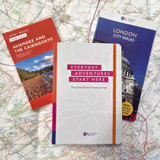 The OS travel journal along with an OS pathfinder guidebook for London and an OS short walks made easy guidebook for Aviemore and the Cairngorms with a map in the background.
