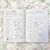 Black and white pages from the Everyday adventures start here book headed National Parks with a list of parks and how to use a compass, with instructions on how to navigate with a compass.