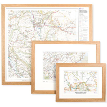 3 Framed pictures of OS Custom Made Maps showing 3 different sizes in oak frames