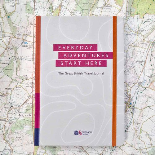 Front cover of the OS Travel Journal with map in the background