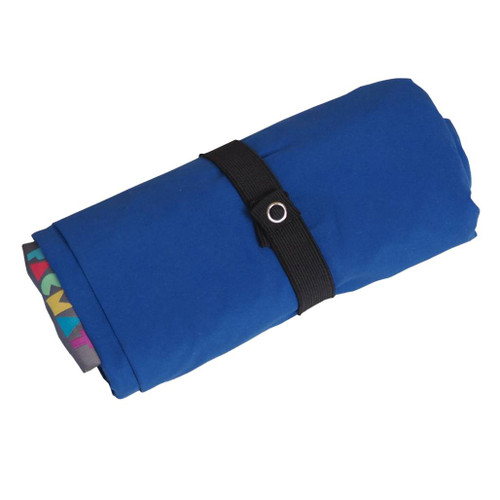 Blue Pacmat Signature Solo PACMAT Picnic Blanket rolled up with black strap and logo viewed from above