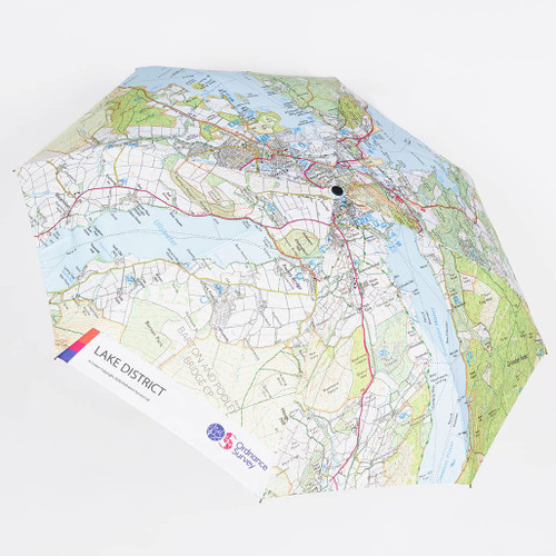 Ordnance Survey OS Lake District Umbrella fully open and facing towards the camera showing the map detail on the canopy