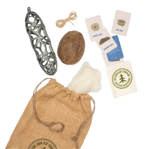 The full contents of The Bird Nest Kit spilled out of its bag including a nesting wool holder, nest id cards and jute string