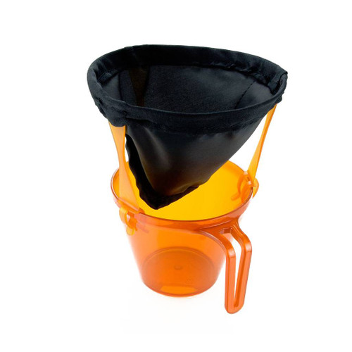 The Ultralite Java Drip by GSI Outdoor black nylon filter clipped above an orange mug, not included, ready to use
