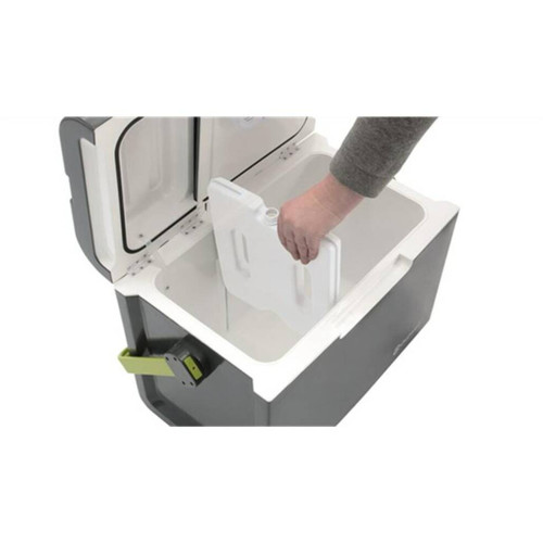 Outwell ECOcool Slate Grey 12V/230V inside view with a person sliding the icepack divider into place