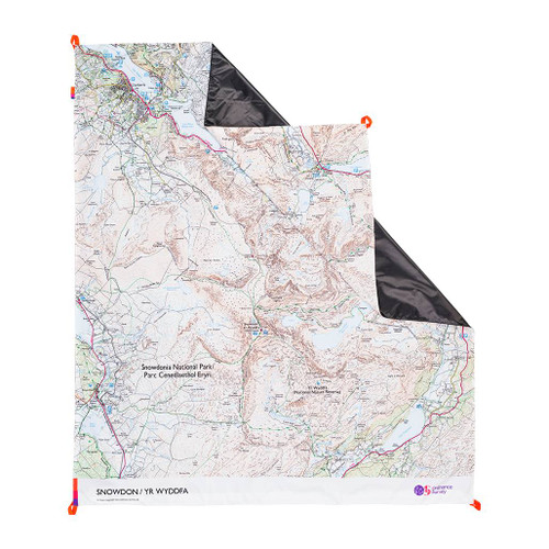 The OS Snowdon Picnic Blanket by Ordnance Survey Outdoor Kit front view of the blanket with the corner turned down to show the waterproof back