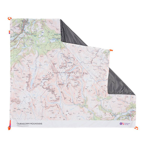 The OS Cairngorms Picnic Blanket by Ordnance Survey Outdoor Kit front view of the blanket with the corner turned down to show the waterproof back